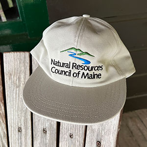 light-colored hat with color NRCM logo
